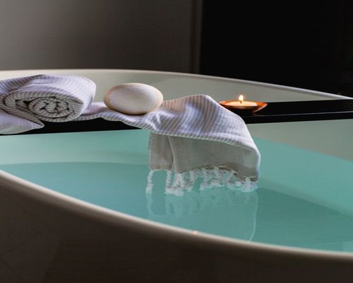 glass of water and towel in a calm wellness setting